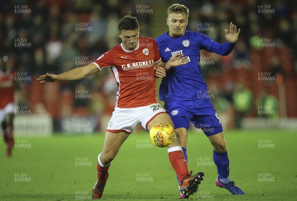 211117 - Barnsley v Cardiff City, Sky Bet Championship - Danny Ward of Cardiff City and Matty Pearson of Barnsley compete for the ball