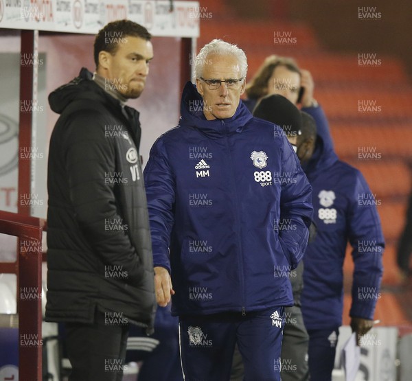 270121 - Barnsley v Cardiff City - Sky Bet Championship -Manager Mick McCarthy of Cardiff walks to the dugout as match starts  and greets Manager Valerien Ismael of Barnsley