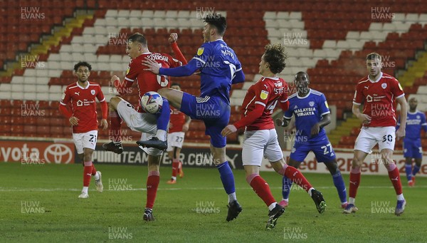 270121 - Barnsley v Cardiff City - Sky Bet Championship - Kieffer Moore of Cardiff and Mads Andersen of Barnsley in goalmouth
