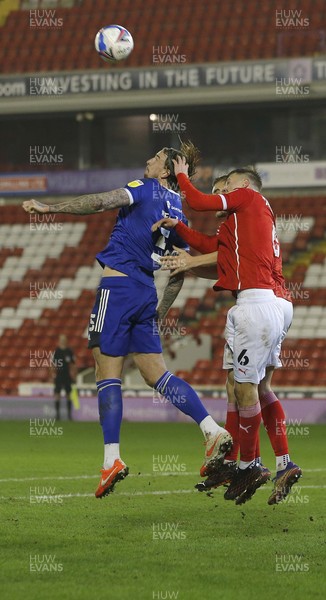 270121 - Barnsley v Cardiff City - Sky Bet Championship - Aden Flint of Cardiff and Mads Andersen of Barnsley go up for the cross