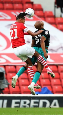 191019 - Barnsley v Swansea City - Sky Bet Championship - Andre Ayew of Swansea and Toby Sibbick of Barnsley