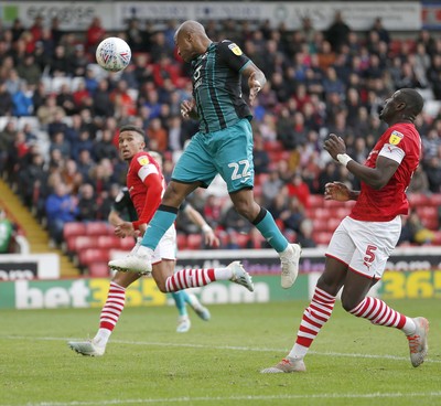 191019 - Barnsley v Swansea City - Sky Bet Championship - Andre Ayew of Swansea heads in the 1st goal of the match past Brad Collins of Barnsley