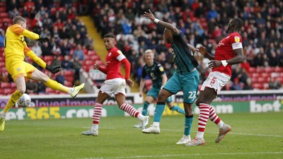 191019 - Barnsley v Swansea City - Sky Bet Championship - Andre Ayew of Swansea heads in the 1st goal of the match past Brad Collins of Barnsley