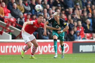 191019 - Barnsley v Swansea City - Sky Bet Championship - Aapo Halme of Barnsley and Sam Surridge of Swansea