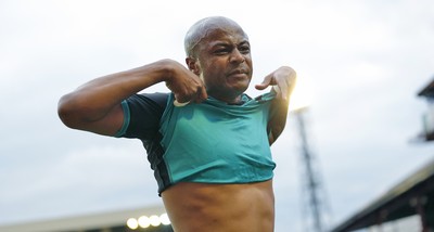 191019 - Barnsley v Swansea City - Sky Bet Championship - Andre Ayew of Swansea at the end of the match salutes the fans and gives away his shirt