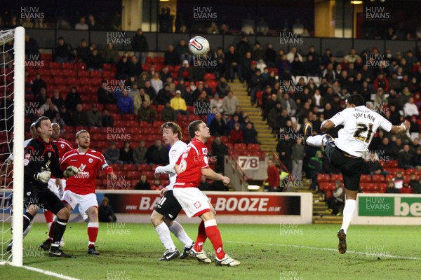 22.01.11 -Barnsley v Swansea City, Npower Championship - Swansea City's Scott Sinclair heads just over the bar 