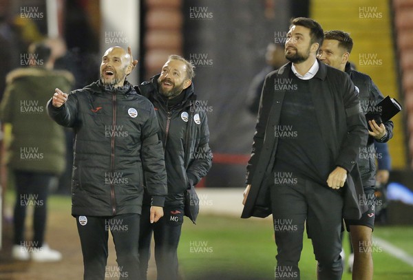 241121 - Barnsley v Swansea City - Sky Bet Championship - Head Coach Russell Martin  of Swansea and team smile at people in Directors box