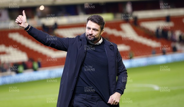 241121 - Barnsley v Swansea City - Sky Bet Championship - Head Coach Russell Martin  of Swansea celebrates to fans at the end of the match