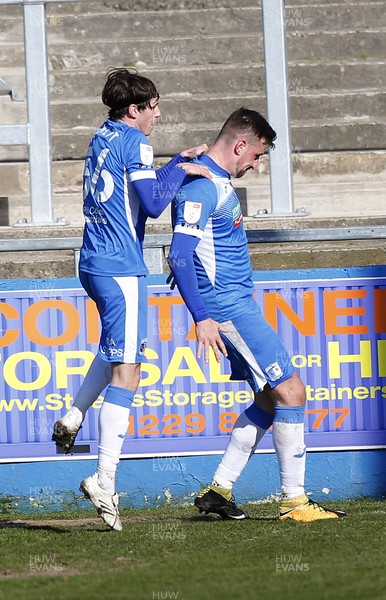 020421 - Barrow v Newport County - Sky Bet League 2 - Scott Quigley of Barrow (right) celebrates scoring their first goal with Jamie Devitt