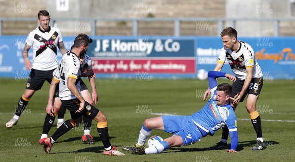 020421 - Barrow v Newport County - Sky Bet League 2 - Scott Quigley of Barrow gets a supporting hand from Mickey Demetriou of Newport County