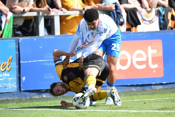 020526 - Barrow v Newport County - Sky Bet League 2 -  Matthew Baker of Newport County is challenged by Josh Gordon of Barrow