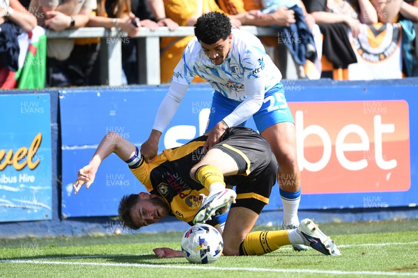 020526 - Barrow v Newport County - Sky Bet League 2 -  Matthew Baker of Newport County is challenged by Josh Gordon of Barrow