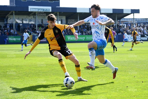 020526 - Barrow v Newport County - Sky Bet League 2 -  Joe Thomas of Newport County is challenged by Charlie McCann of Barrow