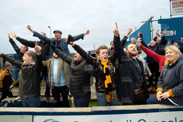 110223 - Barrow v Newport County - Sky Bet League 2 - Newport County fans celebrate them scoring a goal in the 95th minute to win the game 1-0