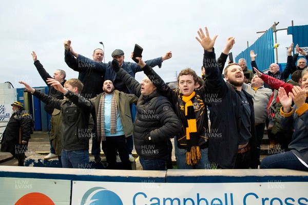 110223 - Barrow v Newport County - Sky Bet League 2 - Newport County fans celebrate them scoring a goal in the 95th minute to win the game 1-0