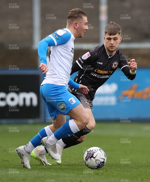 230324 - Barrow v Newport County - Sky Bet League 2 - Lewis Payne of Newport County and Ben Whitfield of Barrow