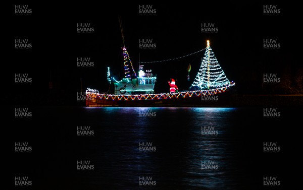 131220 - A boat in the harbour at Barry Island, South Wales, is decked out with a Santa and Christmas lights in the run up to Christmas
