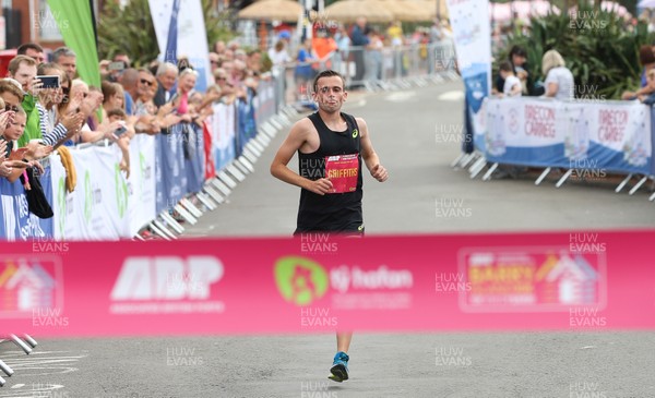 040819 - Barry Island 10k road race, Barry - Joshua Griffiths of Swansea Harriers comes home to win the race