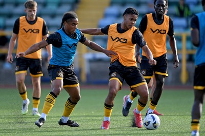 250725 - Barry Town United v Newport County - Pre Season Friendly - Moses-Alexander Walker and Armani Babah of Newport County