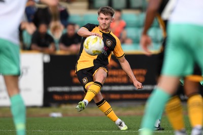 250725 - Barry Town United v Newport County - Pre Season Friendly - Ben Lloyd of Newport County has a shot at goal