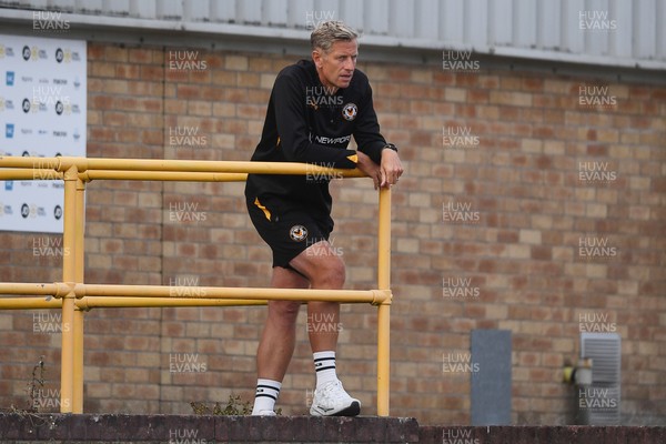 250725 - Barry Town United v Newport County - Pre Season Friendly - Newport County Manager, David Hughes watches the match from the stands
