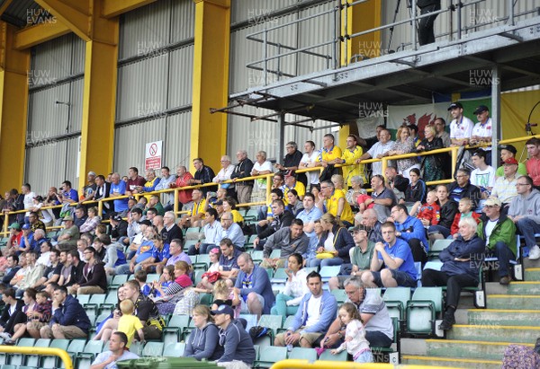 270713 - Barry Town v Cardiff City - Pre Season Friendly -    Fans pack the stands at Jenner Park, Barry to watch the game 