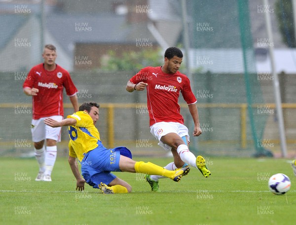 270713 - Barry Town v Cardiff City - Pre Season Friendly -    Theo Warton of Cardiff City, right, is tackled by James Saddler of Barry Town