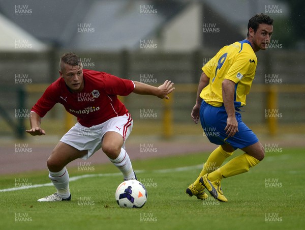 270713 - Barry Town V Cardiff City - Pre Season Friendly -Kane Owen of Cardiff City looks for a way past Ryan Jenkins of Barry Town