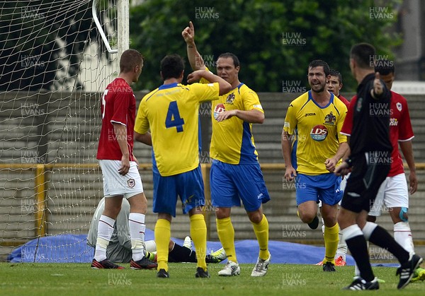 270713 - Barry Town V Cardiff City - Pre Season Friendly -Barry Town players celebrate a goal