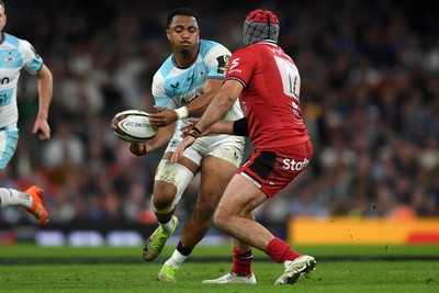 230525 - Bath Rugby v Lyon Olympique Universitaire - EPCR Challenge Cup Final - Max Ojomoh of Bath Rugby is challenged by Beka Saginadze of Lyon Olympique Universitaire