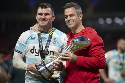 230525 - Bath Rugby v Lyon Olympique Universitaire - EPCR Challenge Cup Final - Ben Spencer of Bath Rugby and Johann van Graan, Bath Head Coach with the trophy at full time