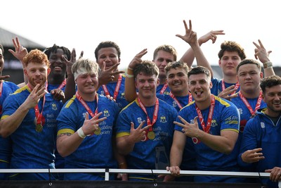 220426 - Bath v Loughborough - Men's BUCS Final - Bath players celebrate lifting the trophy and winning the treble at full time