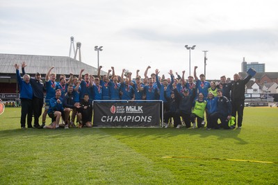 220426 - Bath v Loughborough - Men's BUCS Final - Bath players celebrate lifting the trophy and winning the trebble