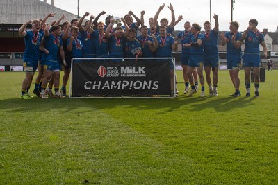 220426 - Bath v Loughborough - Men's BUCS Final - Bath players celebrate lifting the trophy and winning the trebble