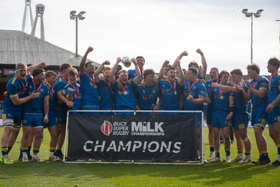 220426 - Bath v Loughborough - Men's BUCS Final - Bath players celebrate lifting the trophy and winning the trebble