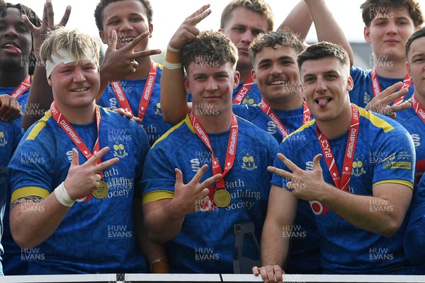 220426 - Bath v Loughborough - Men's BUCS Final - Bath players celebrate lifting the trophy and winning the treble at full time
