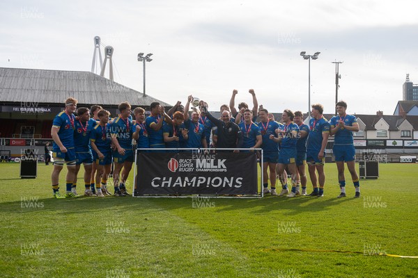 220426 - Bath v Loughborough - Men's BUCS Final - Bath players celebrate lifting the trophy and winning the trebble