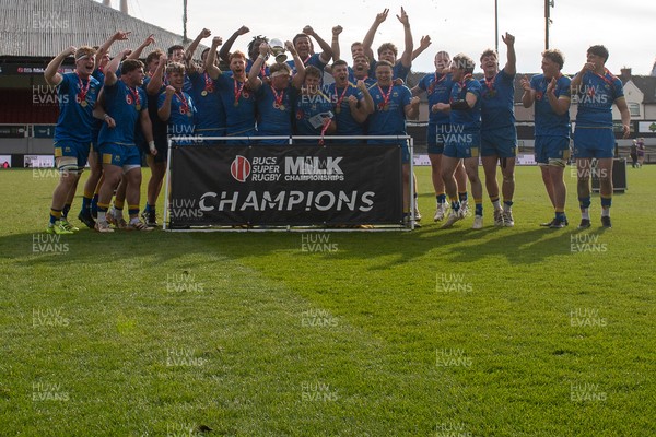 220426 - Bath v Loughborough - Men's BUCS Final - Bath players celebrate lifting the trophy and winning the trebble