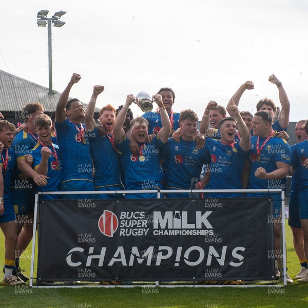 220426 - Bath v Loughborough - Men's BUCS Final - Bath players celebrate lifting the trophy and winning the trebble