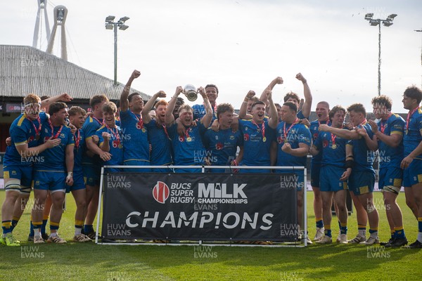 220426 - Bath v Loughborough - Men's BUCS Final - Bath players celebrate lifting the trophy and winning the trebble
