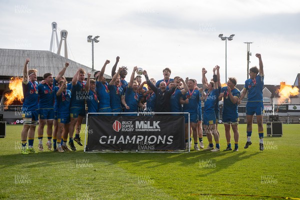 220426 - Bath v Loughborough - Men's BUCS Final - Bath players celebrate lifting the trophy and winning the trebble