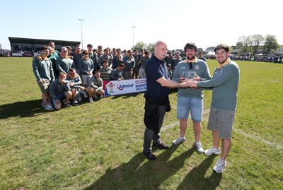 250426 - Beddau Athletic, Admiral National League 6 East Central - Captains Chris Bird and Luke Jones are presented the trophy by Martin Wallace