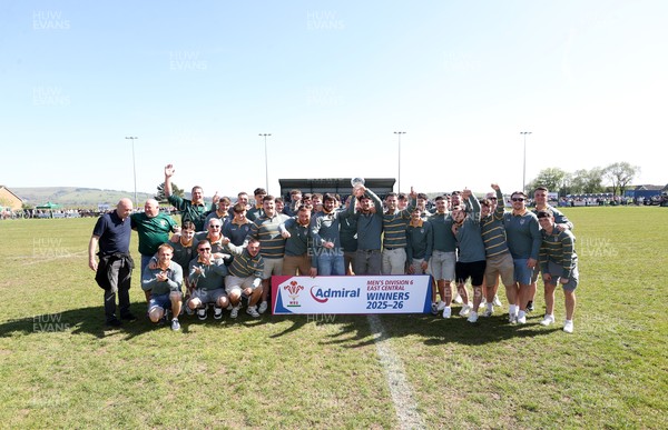 250426 - Beddau Athletic, Admiral National League 6 East Central - Captains Chris Bird and Luke Jones lift the trophy alongside team mates