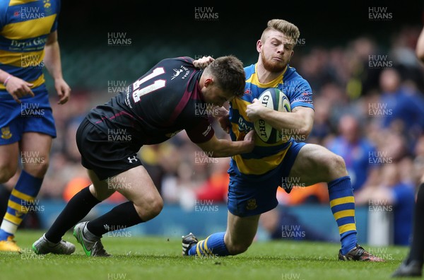 300416 - Bedlinog v Penallta - SSE SWALEC Plate Final - Elliot Keep of Penallta is tackled by Rhys Walker of Bedlinog