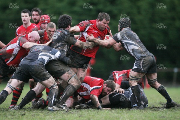 15.01.11 Bedwas v Aberavon... Aberavon's Richard Morris is tackled by Brendan Lampitt and Rob Carter. 