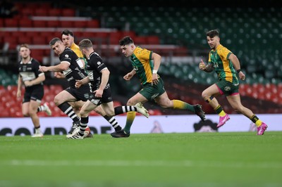 120426 - Bedwas v Bridgend Athletic - Mens Championship Cup Final - Gabriel Brown of Bridgend chases the ball down the field to score a try