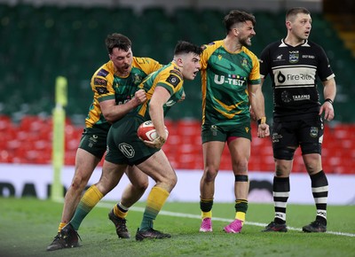 120426 - Bedwas v Bridgend Athletic - Mens Championship Cup Final - Gabriel Brown of Bridgend chases the ball down the field to score a try
