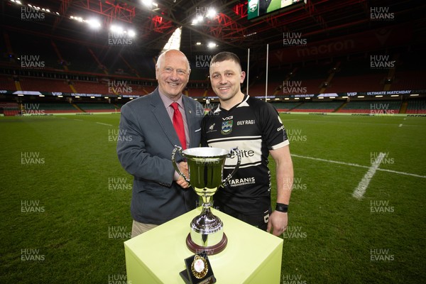 120426 - Bedwas v Bridgend Athletic - Mens Championship Cup Final - Captain Dale Rogers is presented the trophy by WRU president Terry Cobner