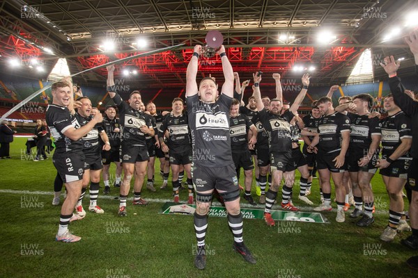 120426 - Bedwas v Bridgend Athletic - Mens Championship Cup Final - Dale Rogers lifts the trophy with team mates