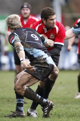 27.03.10 Bedwas RFC v Cardiff RFC - Swalec Cup 1/4 final - Bewdas' Stuart Thomas steps inside Cardiff's Tom Slater. 